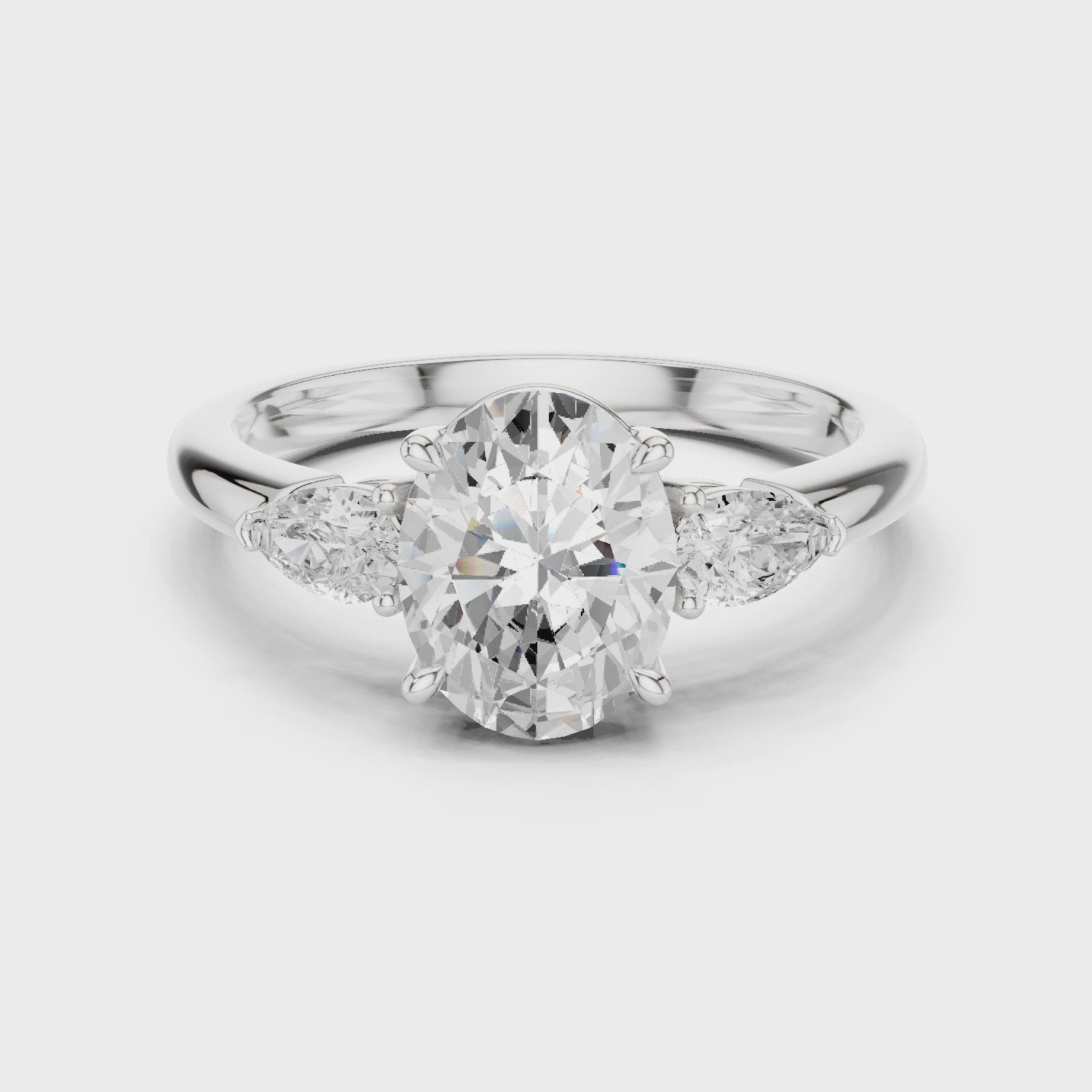 Oval Cut Diamond Three-Stone Engagement Ring
