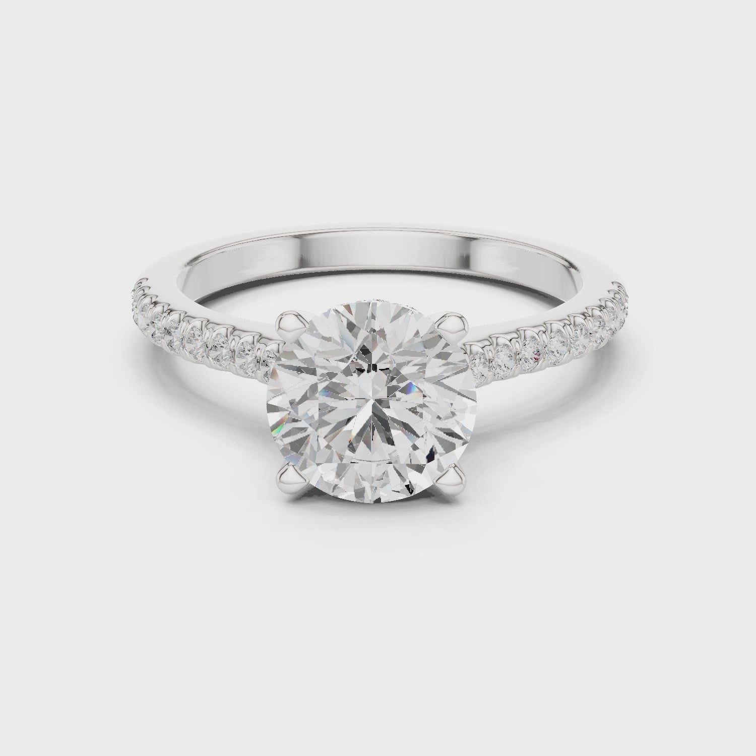 Round-Cut Diamond Hidden Halo Engagement Ring with Pave Band