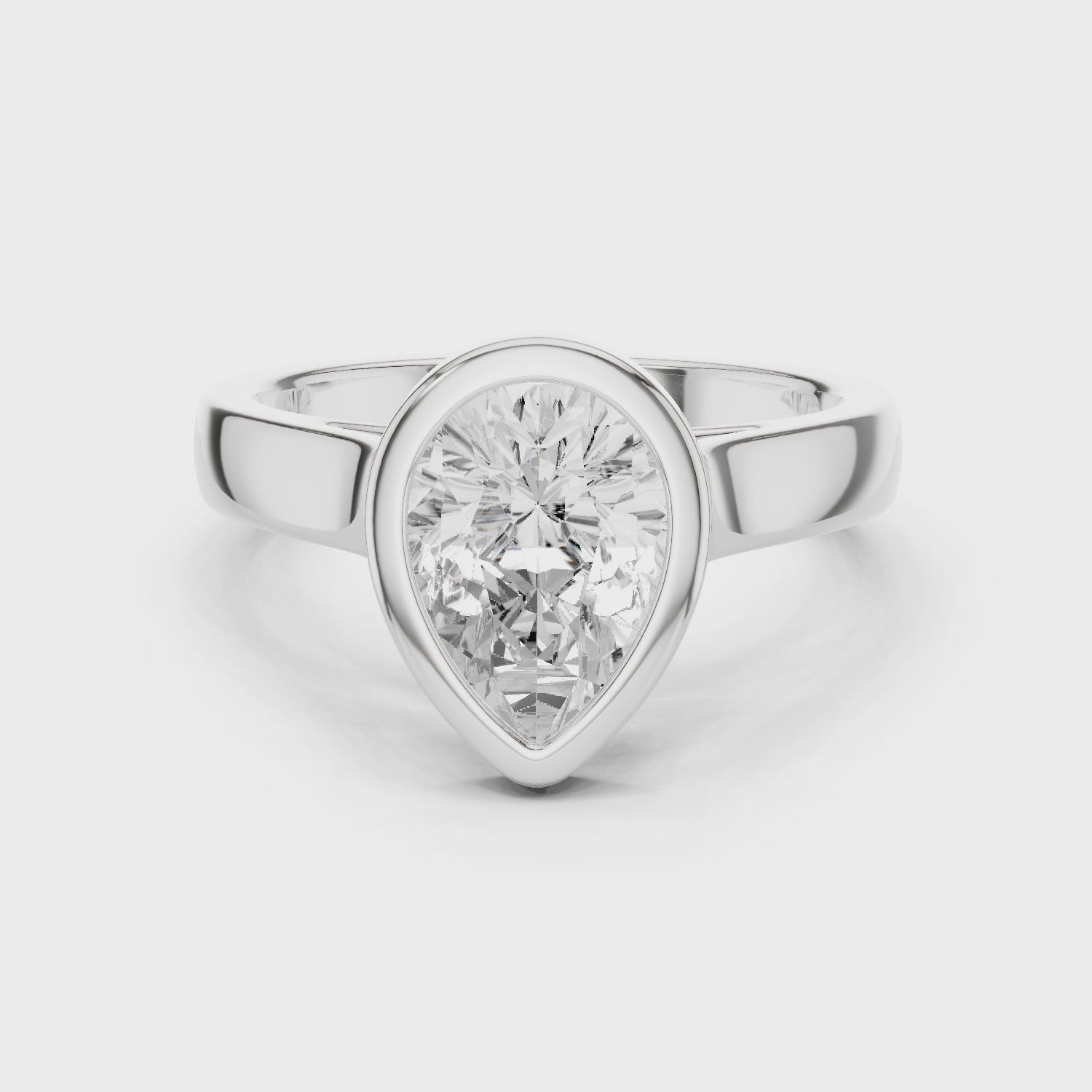 Pear Cut Diamond Bezel Solitaire Engagement Ring