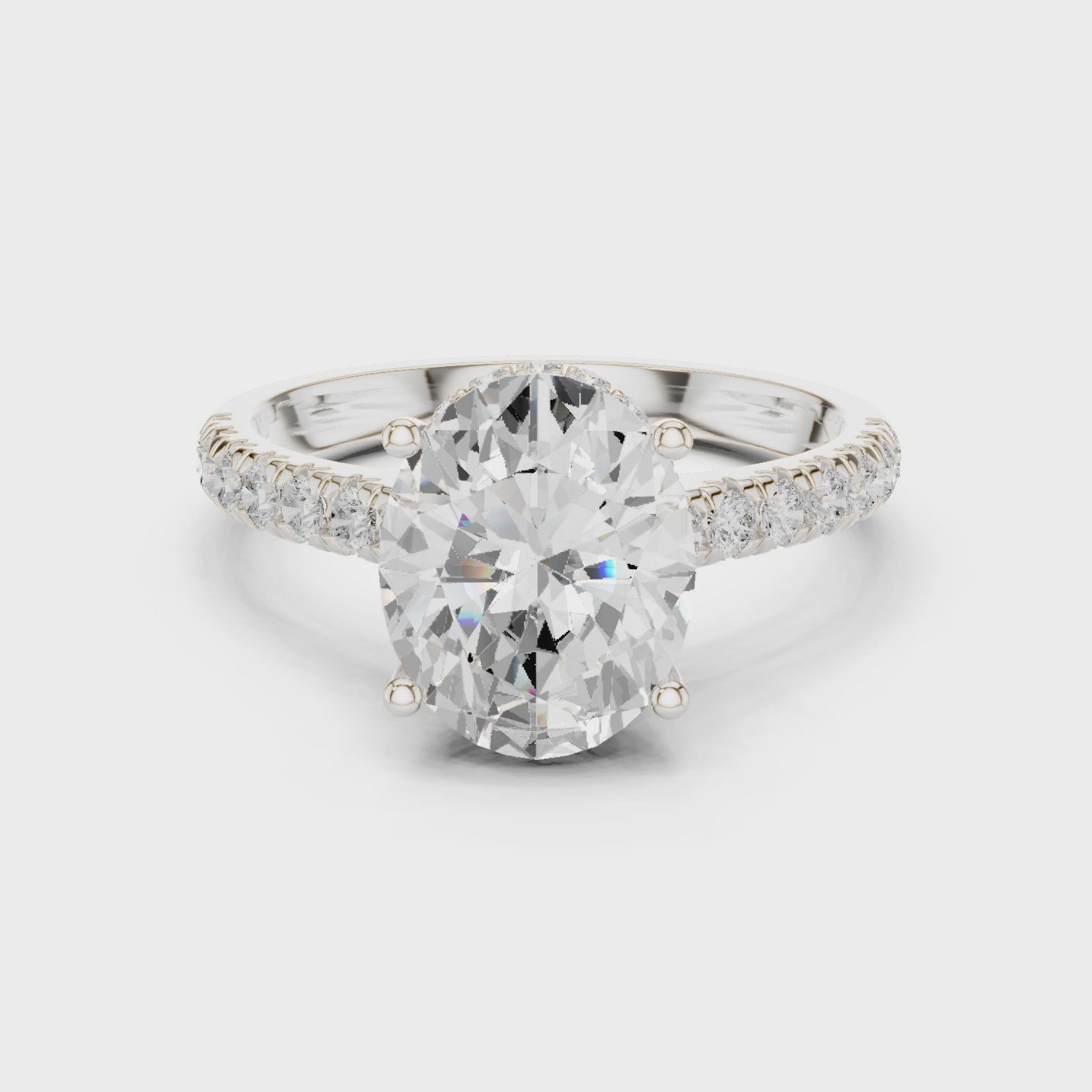 Oval Cut Diamond Hidden Halo Engagement Ring with Pave Band