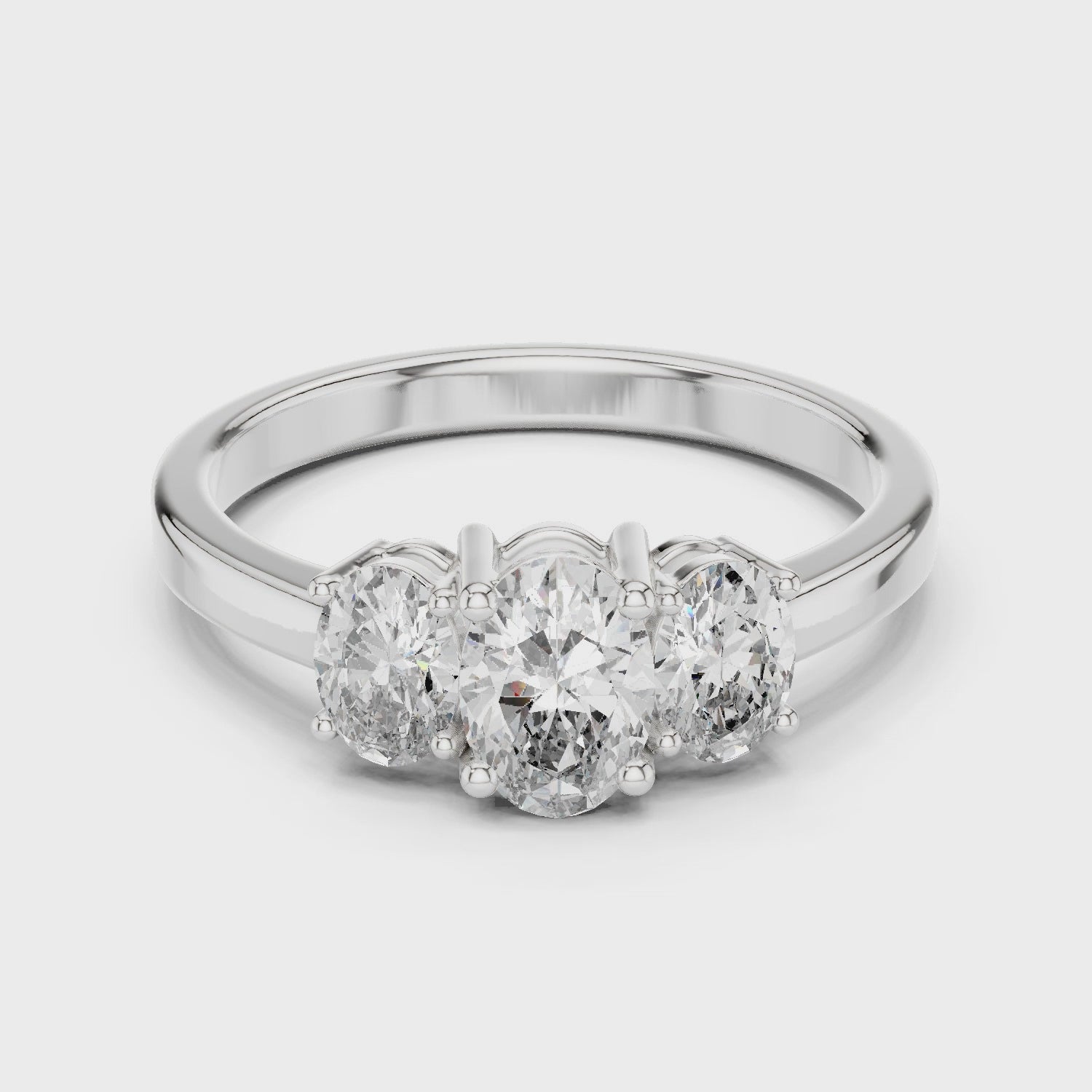 Oval Cut Three-Stone Diamond Engagement Ring