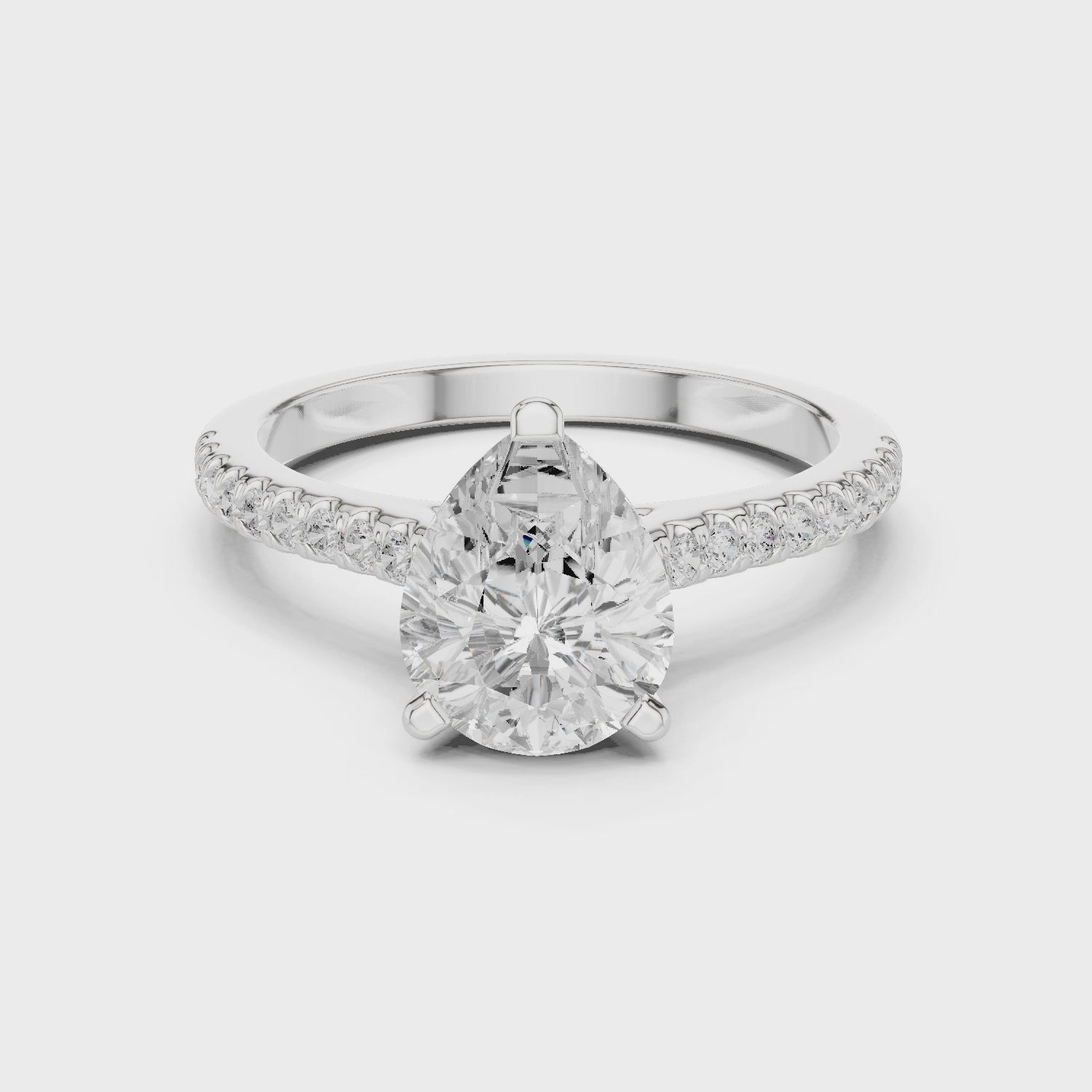 Pear-Cut Diamond Hidden Halo Engagement Ring with Pave Band