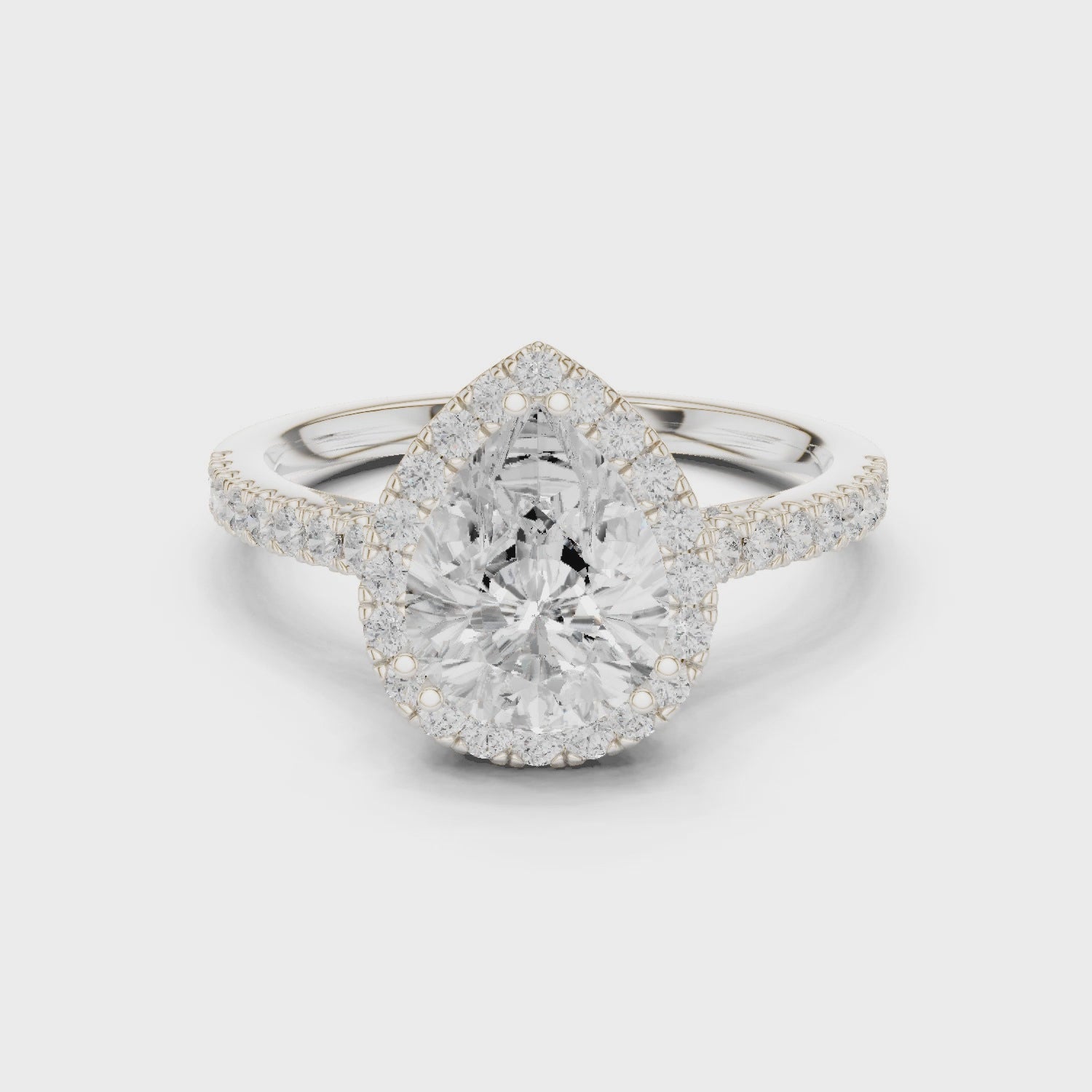 Pear Cut Diamond Halo Engagement Ring with Pave Band