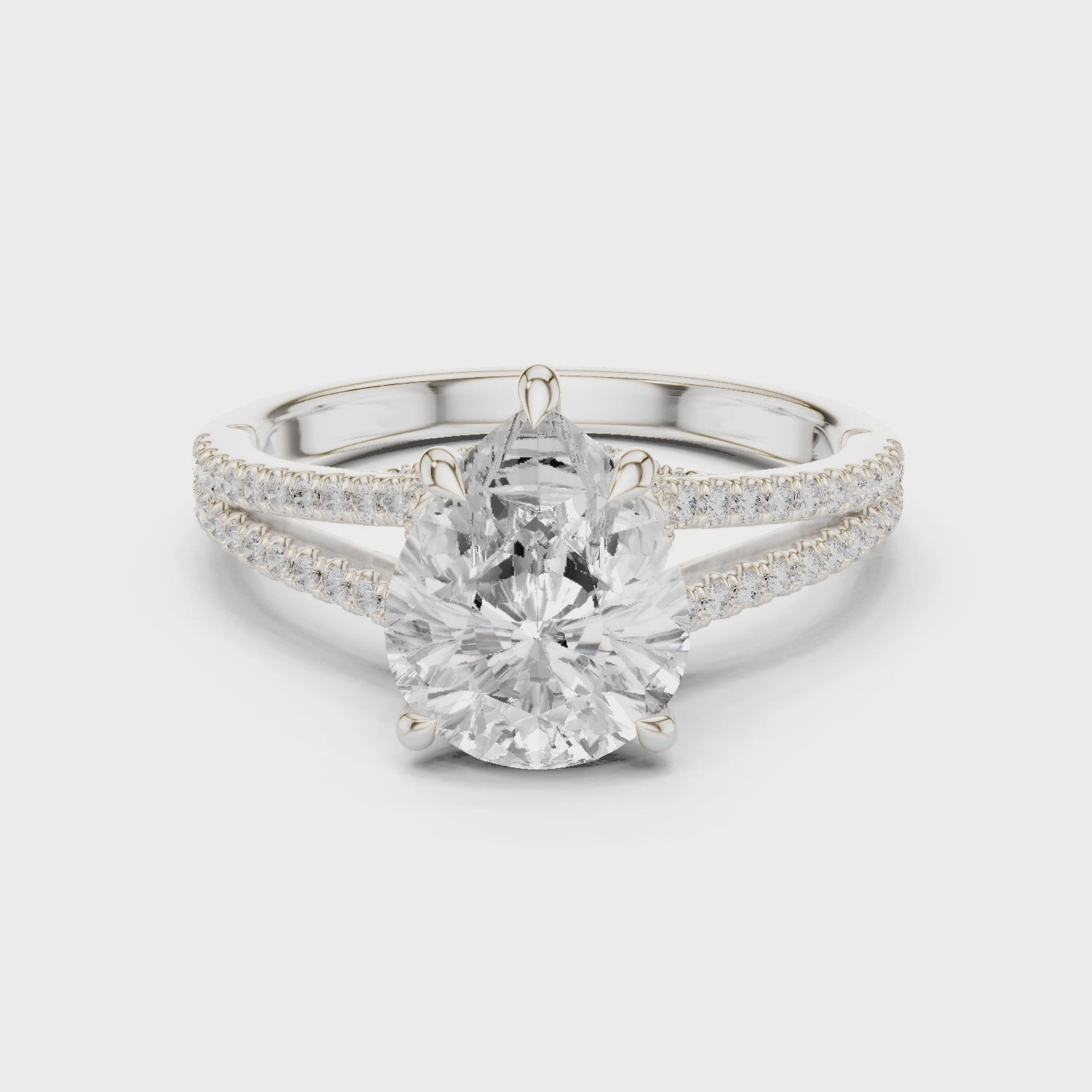 Pear Cut Diamond Split Shank Engagement Ring with Pave Accents
