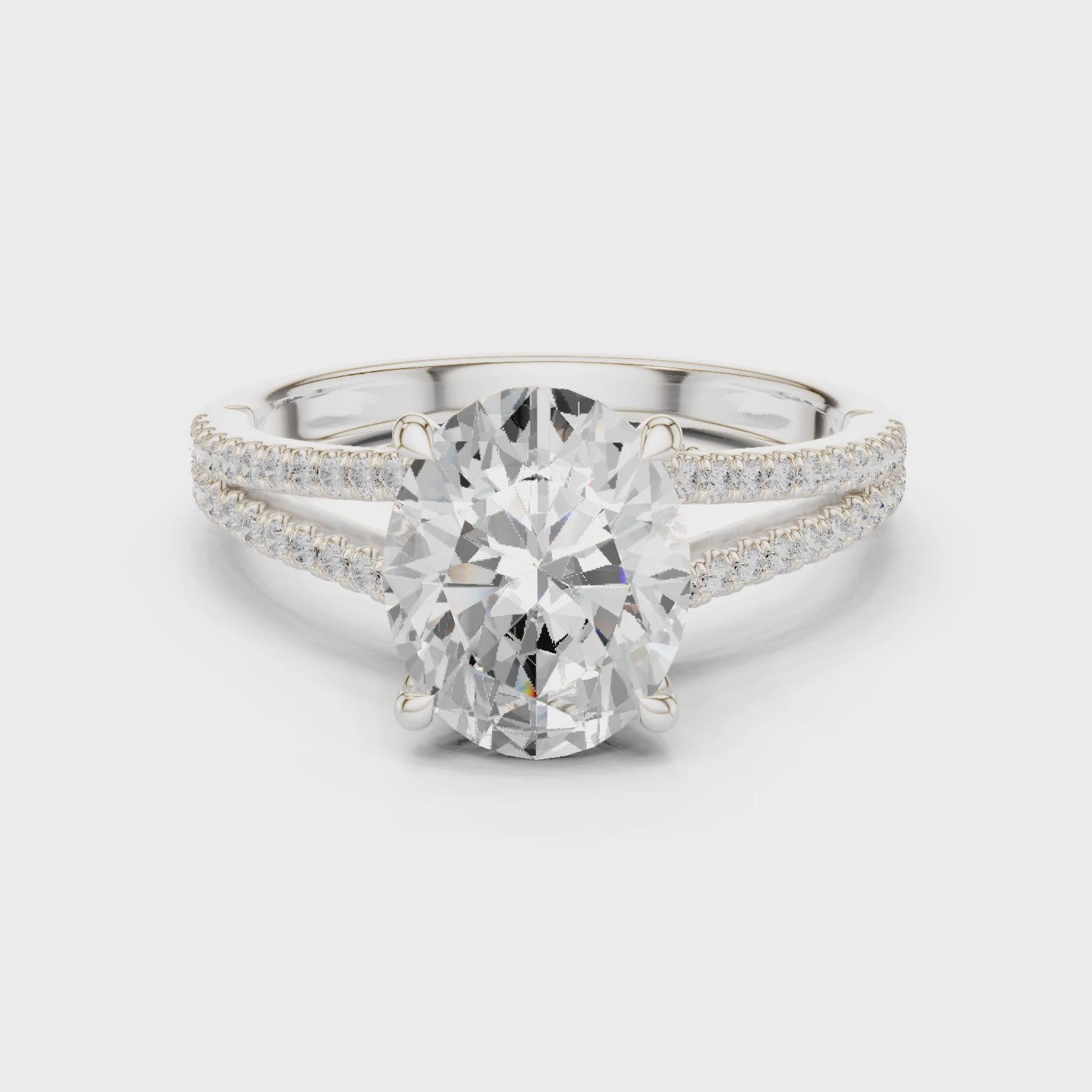 Oval Cut Diamond Split Shank Engagement Ring with Pave Accents